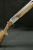 A Fabbrica Bresciana "Fab Arm Select" 12 bore shotgun, double barrel over and under, ejector,