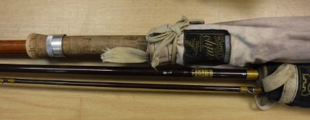 A Hardy "Jet" 8ft two piece trout fly rod and a Hardy two piece fibreglass "Spinning" rod