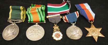 A collection of medals to include the 1939-45 Defence medal,