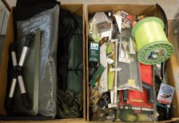 Two boxes containing a large selection of miscellaneous fishing tackle to include rod rests, hooks,