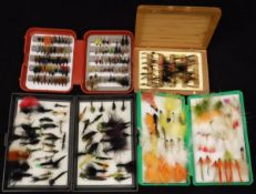 A collection of assorted fly fishing cases containing a good selection of salmon and sea trout