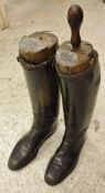 A pair of black riding boots with wooden trees CONDITION REPORTS Measurement from