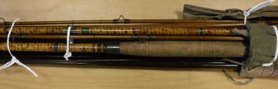 A collection of vintage fishing rods to include a greenheart three piece Charles Farlow salmon fly