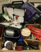 A miscellaneous collection of fishing tackle to include spinning baits, fishing line,