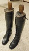 A pair of black riding boots with wooden trees CONDITION REPORTS Measurement from