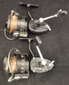 A pair of Mitchell 300S fixed spool reels with skirted spools,