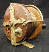 A Milwards "Seafarer" 3½" wooden star back reel