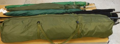 A collection of fishing tackle to include two carp fisher's landing nets,