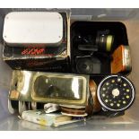 A box containing an assortment of miscellaneous fishing tackle to include a Winfield fly reel,