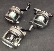 A collection of three Shimano "TLD 5" multiplying sea fishing reels,