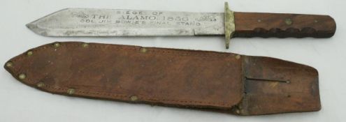 A modern Bowie knife, the blade inscribed "Siege of the Alamo 1836 Col.