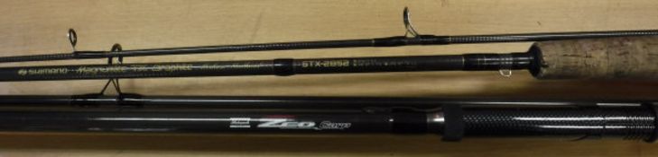 A Shimano "Magnum Lite" TX Graphite two piece spinning rod and a Shakespeare Zeo Carp two piece