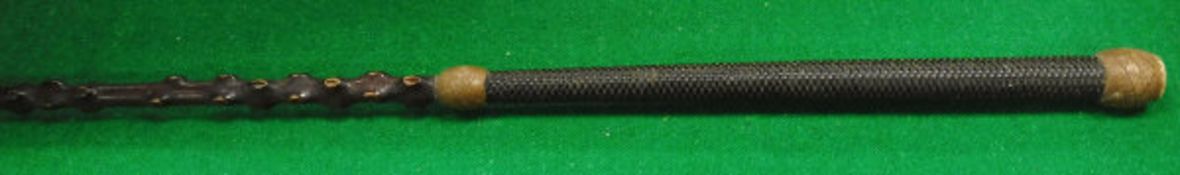 A holly staffed coaching whip with plaited leather shaft