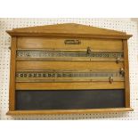 A vintage oak framed snooker scoreboard,