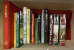 A collection of fifteen books on fishing and a folder of "Pike Lines" magazines,