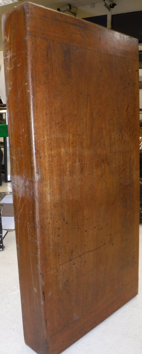 A mahogany bar billiards table