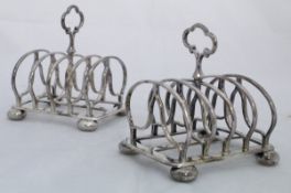 A pair of plated four section toast racks,