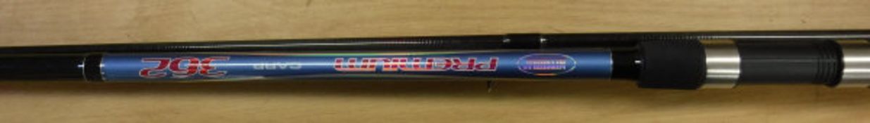 A Mitchell "Premium Carp" two piece fishing rod