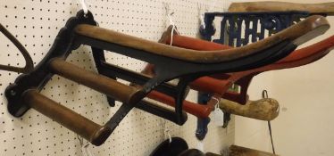 A painted cast iron and mahogany mounted Musgrave saddle rack with similar bridle rack