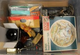 An assortment of miscellaneous fishing tackle to include an Okuma "Airstream" fly reel,