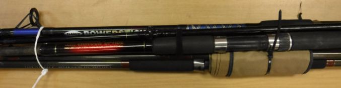 A collection of approximately 10 assorted fibreglass fishing rods to include examples by Daiwa,