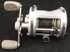 An ABU "Ambassador" 6500C3 multiplying casting reel in maker's box and with paperwork