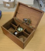 A mahogany compartmented fisherman's compendium containing two lift-out trays,