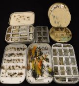 A collection of four Wheatley alloy fly boxes containing a good selection of dry flies,