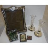 A silver sheathed photo frame in the Art Nouveau manner (by Charles Boyton & Son Birmingham 1942),