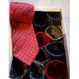 A box containing thirteen silk ties to include Gianni Versace, navy tie with blue ladybirds,