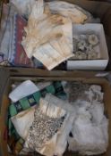 Two boxes of assorted lace trim, gloves, needlework cushion covers, etc,
