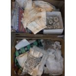 Two boxes of assorted lace trim, gloves, needlework cushion covers, etc,