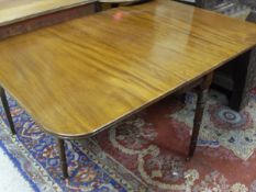 An early 19th Century mahogany drop leaf Sutherland table,