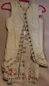 A late 18th / early 19th Century gentleman's linen waistcoat with embroidered decoration,