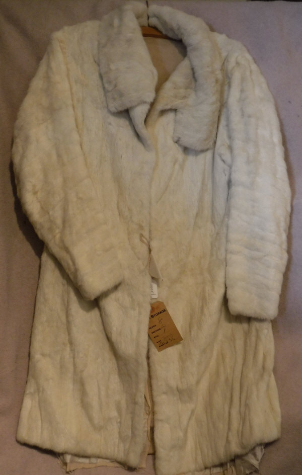 An early 20th Century ermine ¾ length coat,