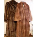 Two musquash full length fur coats, one dark brown,