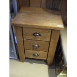A pair of modern teak bedside chests of three drawers CONDITION REPORTS Various