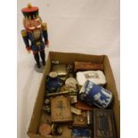 A box of assorted sundry items to include a pin cushion in the form of a shoe,