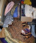 Four boxes of assorted fabrics to include various patterned remnants, bolts of netting,