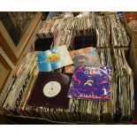 Two boxes containing a large quantity of 45 rpm single records