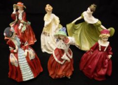 A collection of three Royal Doulton figurines including "Top 'o the Hill" (HN1834),