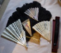 A collection of 19th Century and later fans to include mother of pearl and white metal inlaid fan