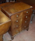 A 19th Century mahogany and satinwood strung commode as a chest of four drawers together with