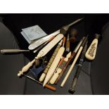 A bag containing assorted seals, silver mounted hard stone pens, mother of pearl mounted pens etc.