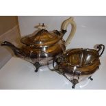 A James Dixon & Son late 19th Century silver plated teapot and matching twin-handled sucrier,