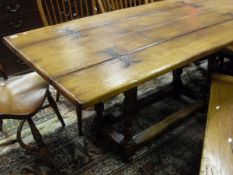 An oak hall or dining table,