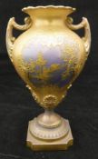A Royal Worcester gilt decorated vase of pear form,