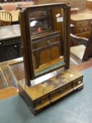 A 19th Century mahogany toilet mirror in the early Georgian manner,
