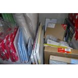 A box containing various Minene storage boxes, children's rugs,