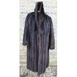 A musquash brown fur full length coat, together with a beaver lamb brown jacket,